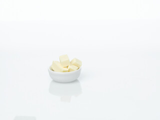 bowl of butter on white background