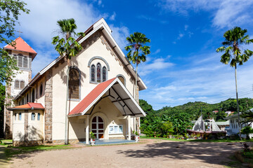 St Anne’s Catholic Church in Baie Ste Anne, Praslin Island, Seychelles, white church building...
