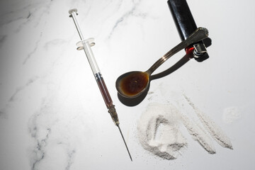 Fototapeta na wymiar Syringes, drugs, heroin, and cooked.