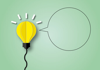 Yellow light bulb with speech bubble on pastel green background, Ideas inspiration concepts of business finance or goal to success, Great idea, Creativity of human, copy space, paper cut design style.