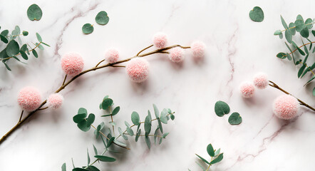 Fresh eucalyptus leaves, twigs with pink fluffy balls. Panoramic banner image. Top view on off...