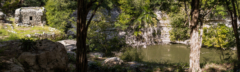 Naklejka na ściany i meble Panoramic view of the great Mayan cenote of Chichen Itza in Piste (Mexico).
