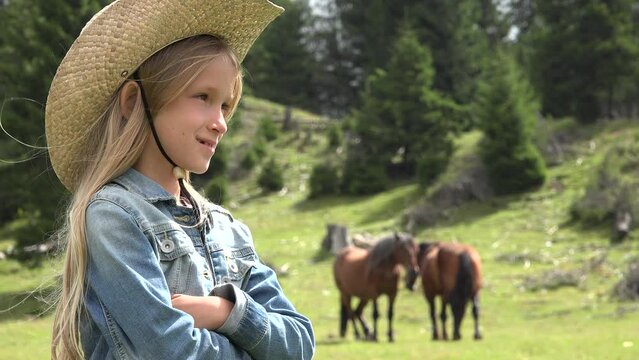 Farmer Child Pasturing Horses, Cowboy Kid with Animals on Meadow, Prairie Rustic Girl Playing Outdoor in Mountains
