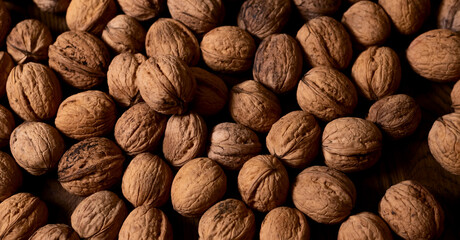 Several walnuts are on the table.