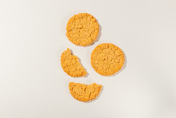 Round cookies over white background, top view.Copy space.