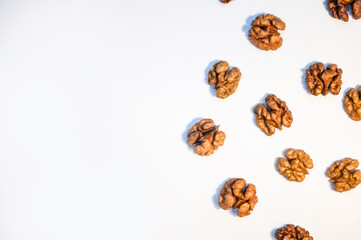 Stack of walnuts on white background