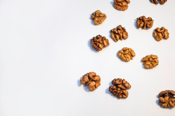 Stack of walnuts on white background