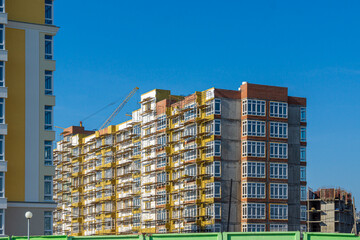 Fototapeta premium construction of a new microdistrict and development of new territories for housing construction in the satellite town of Lesnaya Polyana, selective focus