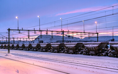 Freight train with iron ore at Kiruna railway station in Swedish Lapland