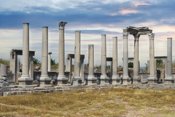 Ancient city of Perge near Antalya Turkey. Columned street and ruins.. Believed to have been built in the 12th to 13th centuries BC. Blue Sky.