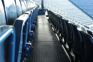 Empty folding seating steel structure installed on Grandstand floor in stadium.	