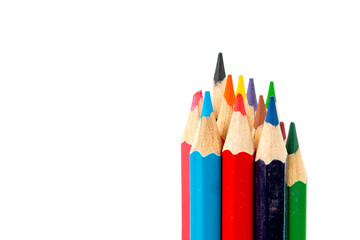 Colored pencils in a stack isolated on a white background. close-up, copy space