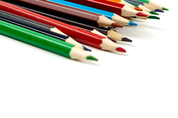Colored pencils isolated on white background. close-up, copy space