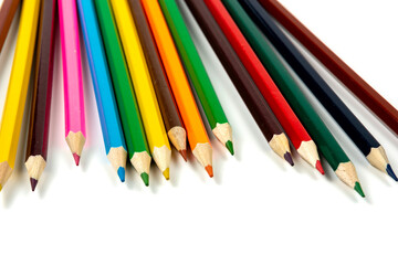 Colored pencils isolated on white background. close-up, copy space