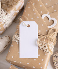 Valentines present with blank gift tag and hearts close up, Rustic label Mockup