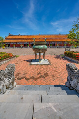 view of the Cuu Dinh in the Imperial City with the Purple Forbidden City within the Citadel in Hue, Vietnam. Imperial Royal Palace of Nguyen dynasty