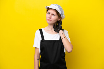 Young English fisherwoman isolated on yellow background having doubts