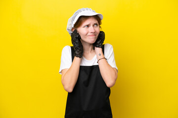 Young English fisherwoman isolated on yellow background frustrated and covering ears