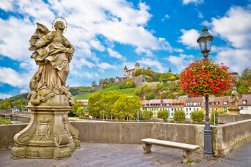 Fototapeta premium Wurzburg. Main river waterfront and scenic Wurzburg castle and vineyards view