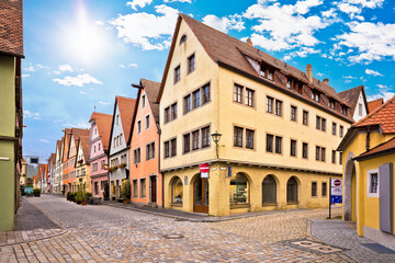 Fototapeta na wymiar Rothenburg ob der Tauber. Cobbled colorful street and architecture of old town of Rothenburg ob der Tauber