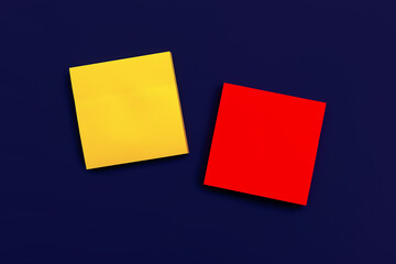 blank yellow square sticky note and red square sticky note on dark blue background, top view. Blank space for future important events announcements
