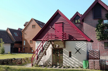 Fototapeta na wymiar View of outbuildings in Bergen on a clear sunny day, Norway. Travel landscape sights of Europe.
