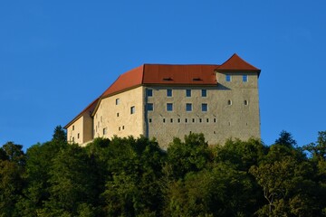 Fototapeta na wymiar View of Rajhenburg castle on a hill above Sava river near Krško in Dolenjska, Slovenia