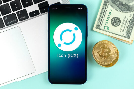 Icon ICX coin symbol. Trade with cryptocurrency, digital and virtual money, banking with mobile phone concept. Business workspace, table with laptop top view photo