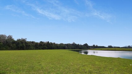 Green park outdoor with blue sky cloud