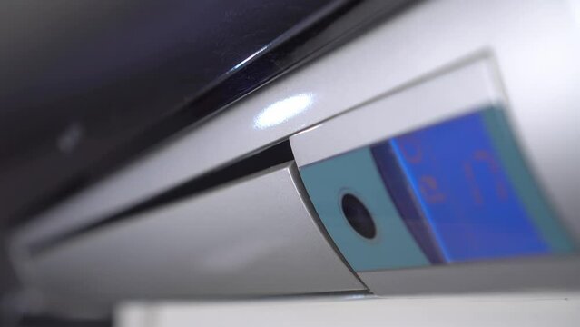 Turning on and off the operation of the air conditioner. Rotation of the impeller of the outdoor unit. The LCD display with the inscription cooling turns on and is illuminated with neon or blue glow.