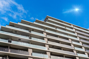 Exterior of high-rise condominium and refreshing blue sky scenery_sky_37