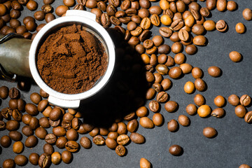 Coffee beans in the coffee machine horn. Postcard for cafes and restaurants. Close up.