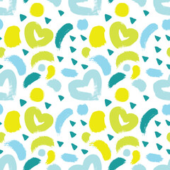 Seamless pattern with hearts in yellow and blue colors. Dry brush.