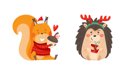 Fototapeta premium Happy animals celebrating Christmas set. Cute hedgehog and squirrel in Santa hat and deer horns holding gifts cartoon vector illustration