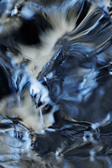 Obraz na płótnie Canvas Melting ice water closeup