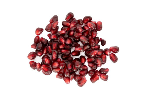 seeds of a pomegranate isolated on white background