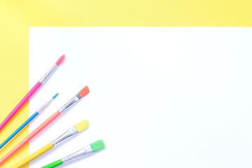 Naklejka premium Multicolored paint brushes