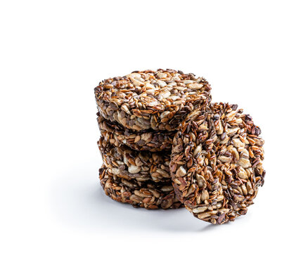 Healthy fitness cookies from sunflower seeds and sesame seeds with flax seeds isolated on white