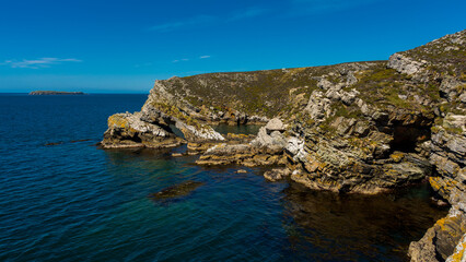 rugged coastal landscape in Falkland Islands during summer months
