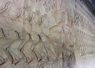 Ancient Mythological War Storytelling Engraved on the Walls of Angkor Wat