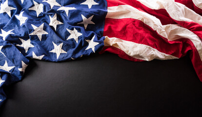 Happy presidents day concept with flag of the United States on dark  background.