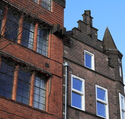Amsterdam Nieuwezijds Voorburgwal Street Historic Brick House Facade with Stepped Gable, Netherlands