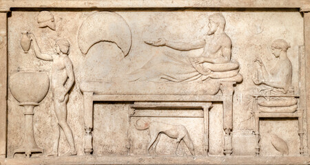 Marble funerary stele with a banquet scene from Thassos (Greek).
