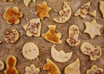 Process of making homemade cookies from shortcrust pastry with a variety of sprinkles