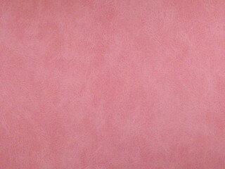 Pink suede surface textured as a background. High quality photo