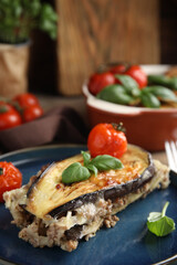 Plate of delicious eggplant lasagna on table