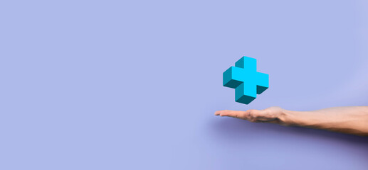 Businessman hold 3D plus icon, man hold in hand offer positive thing such as profit, benefits, development, CSR represented by plus sign.The hand shows the plus sign