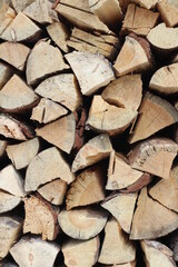 Fototapeta premium Stack of firewood full frame