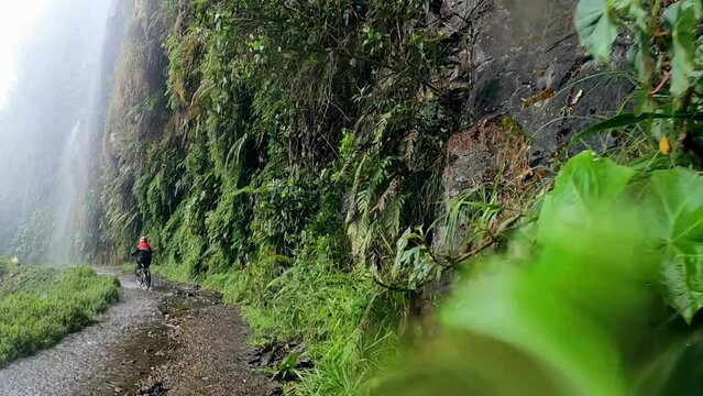 Pov of mountain biker riding on Death Road in Bolivia