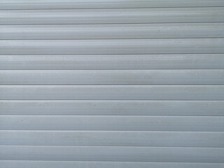 Obraz premium old metal shutters of a store